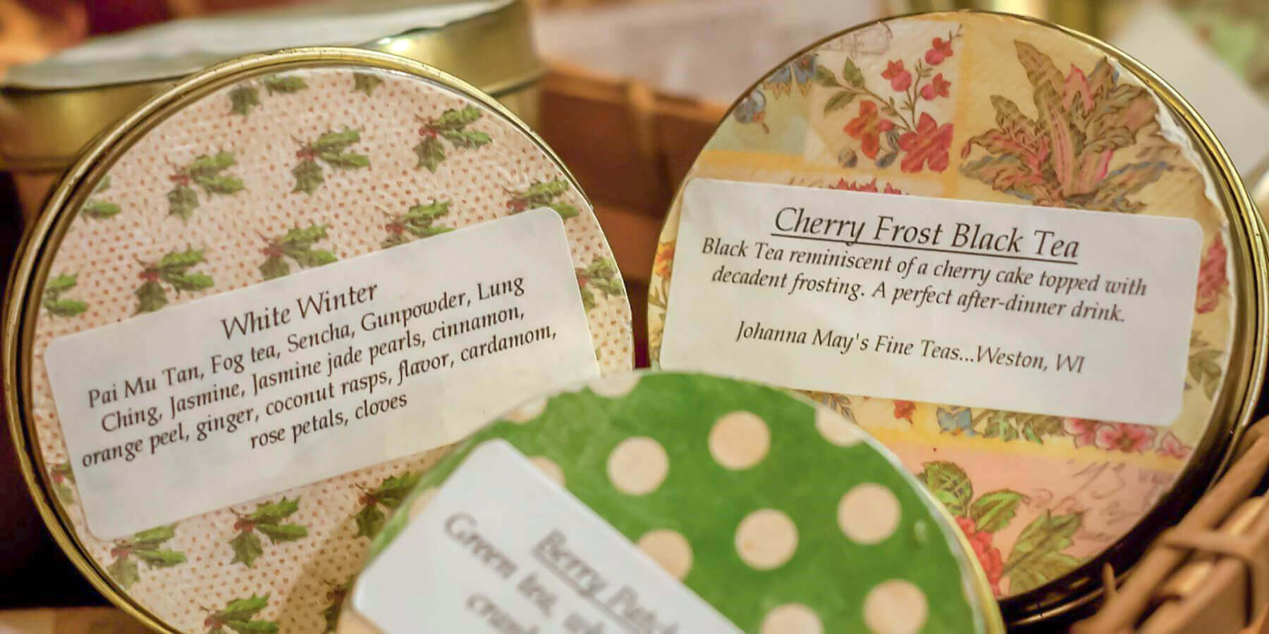Three canisters of tea